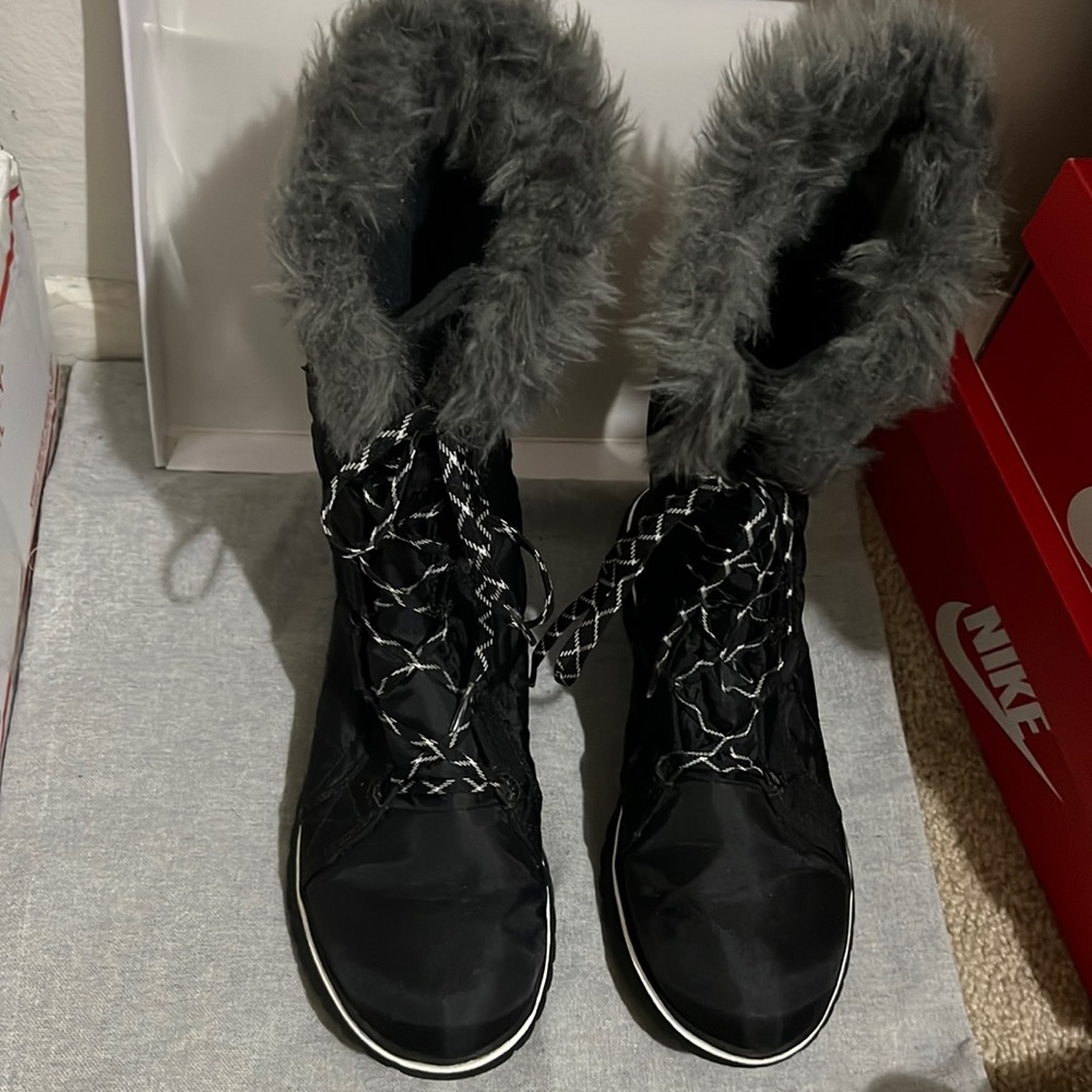 Tall black Sorel winter boots
